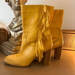 Yellow fringe leather boots with a western vibe #freepeopleboots #freepeople